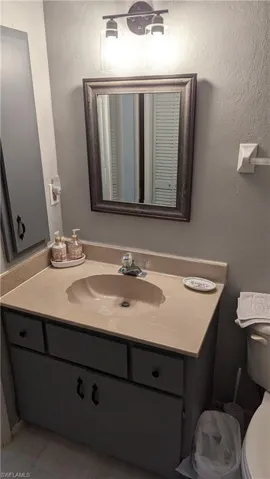 Bathroom featuring toilet and vanity