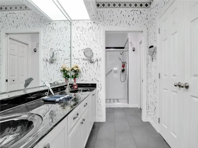 primary bathroom and walk in closet