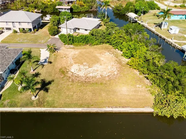 Aerial view of residential area with a nearby body of water