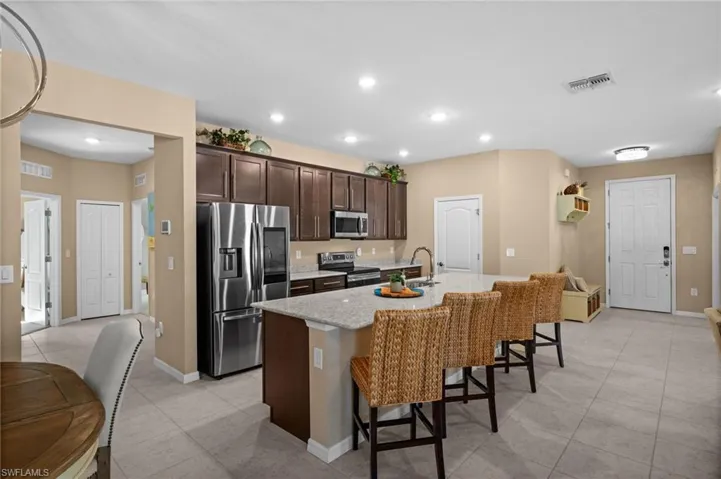 Large kitchen island with breakfast bar