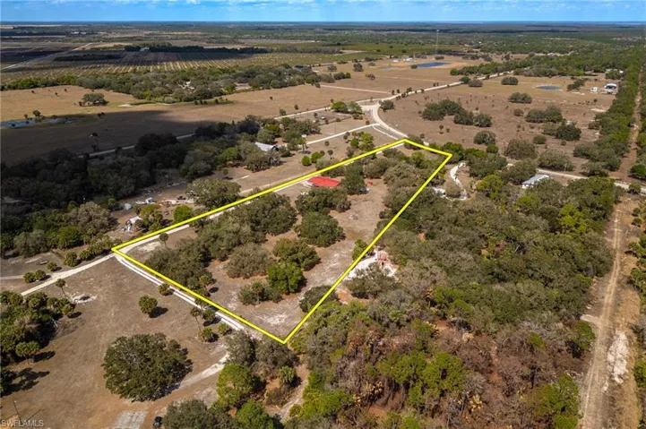 View of rural area featuring property parcel outlined and abundant farmland