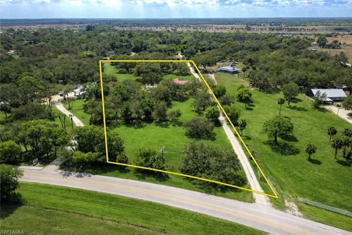 Aerial overview of property's location featuring property parcel outlined