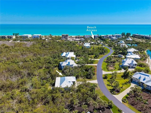 Coastal community featuring direct beach access, paved roadways, and modern architecture