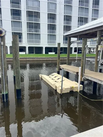 Dock featuring a water view