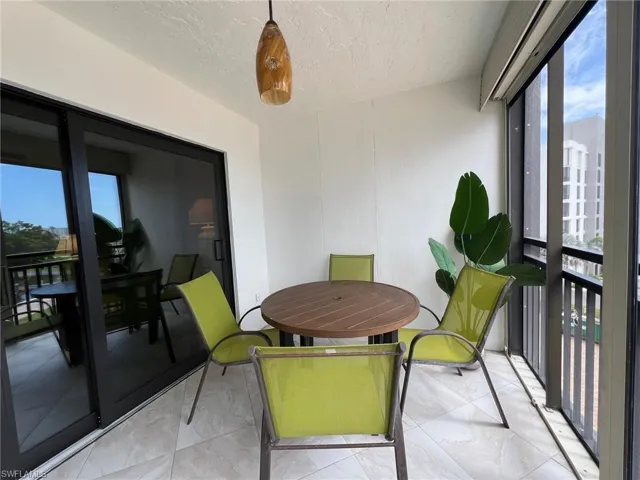 Sunroom / solarium with healthy amount of natural light