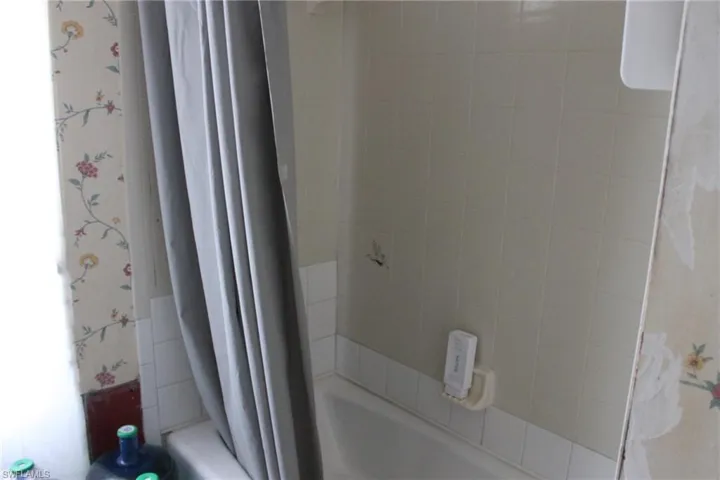 Bathroom featuring shower / tub combo