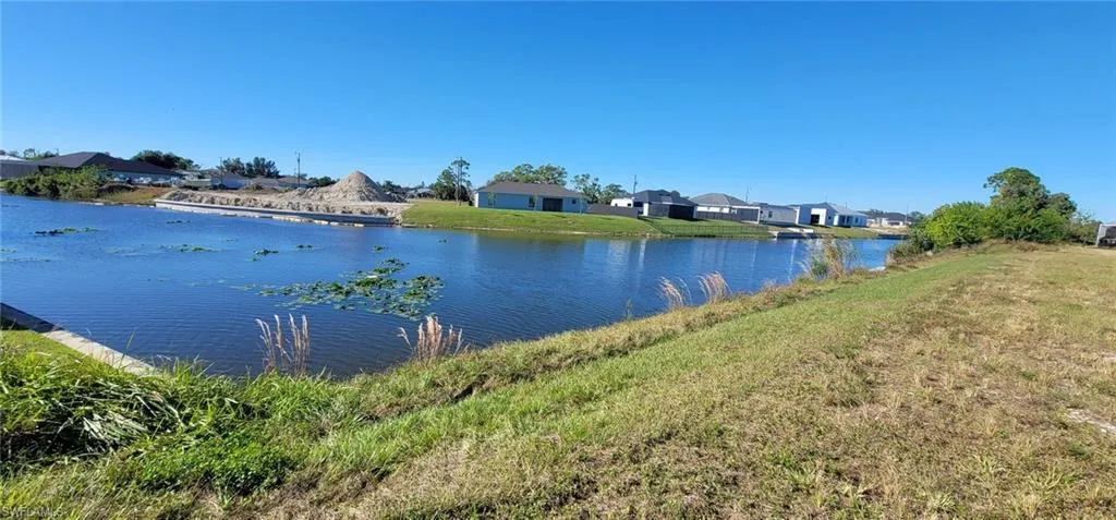 Water view featuring nearby suburban area