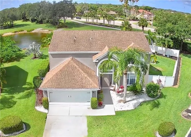 View from above of property with a nearby body of water