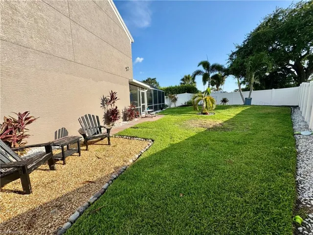 View of fenced backyard