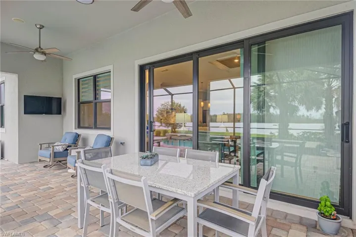 View of patio with ceiling fan