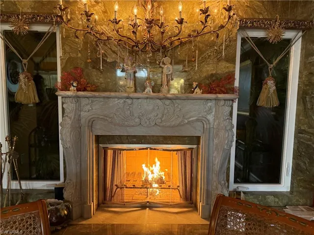 Detailed view of a warm lit fireplace