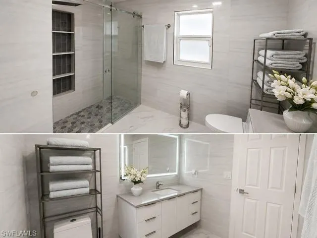 Glass-enclosed shower with hexagonal tile flooring and built-in shelving
