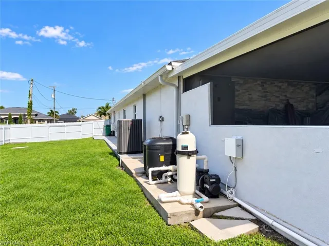Private backyard with a vinyl fence