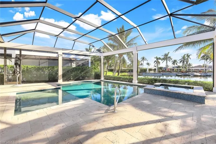 Sun Shelf and Lovely Saltwater Pool and Spa with two large picture screens to open view!