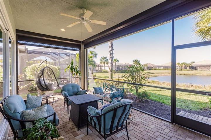 BEAUTIFUL LANAI WITH PAVERS. ALL LANAI FURNITURE REMAINS. HUGE VALUE.