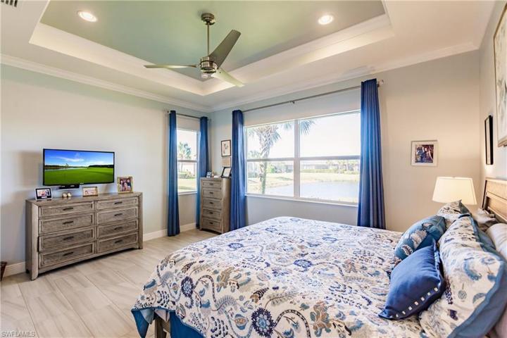 WHAT A VIEW. COME & SEE FOR YOURSELF. YES, THE TV & BEDROOM FURNITURE STAY WITH THE HOME.