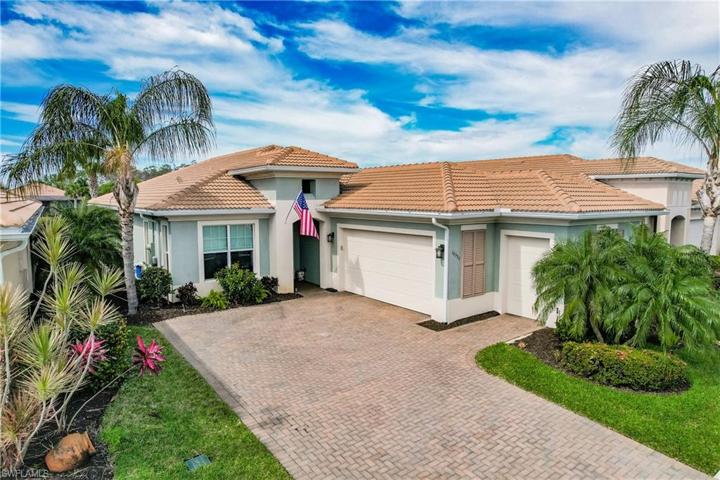 2017 WCI BUILT SAN REMO MODEL HOME WITH 4 BEDROOMS PLUS 2 & 1/2 BATHS & A GOLF CART GARAGE.