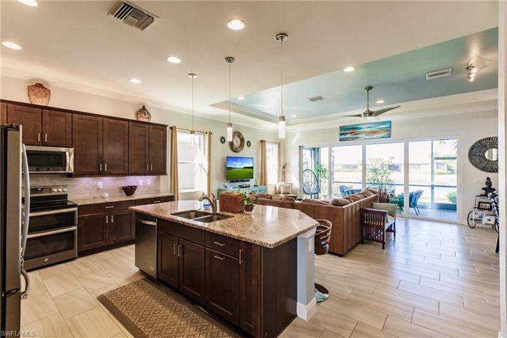 BEAUTIFUL KITCHEN WITH PLENTY OF CABINETS (SOFT-CLOSE DRAWERS) & COUNTERTOPS PLUS A HUGE ONE LEVEL ISLAND. NOTE THE DOUBLE OVEN. ALL NEW UPGRADED APPLIANCES.