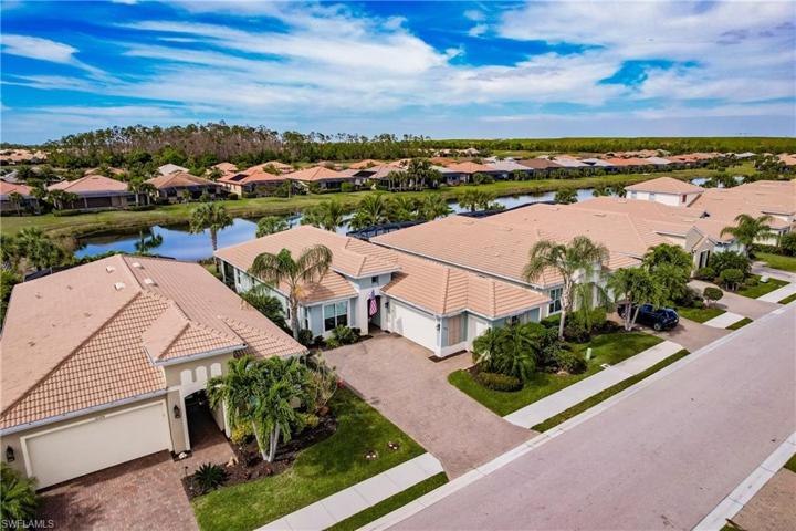 GREAT VIEW OF ONE OF THE LARGEST DRIVEWAYS IN PELICAN PRESERVE. NOTE: THIS HOME COMES WITH A WHOLE HOUSE WATER FILTRATION SYSTEM.