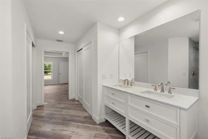 Dual closets with the larger walk in on the left side of the picture