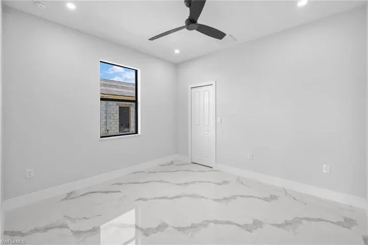 Unfurnished room with ceiling fan