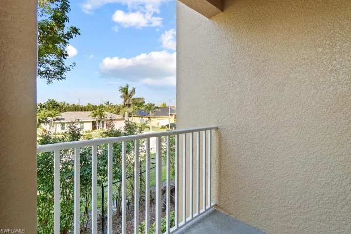 Balcony featuring a residential view
