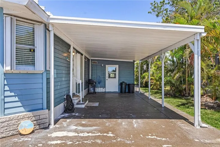 View of patio / terrace featuring a carport and area for grilling