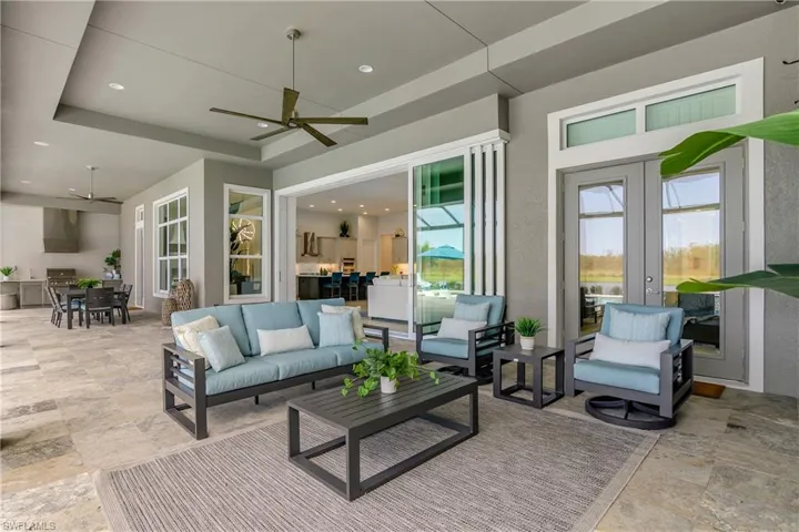 View of patio / terrace featuring ceiling fan and an outdoor hangout area