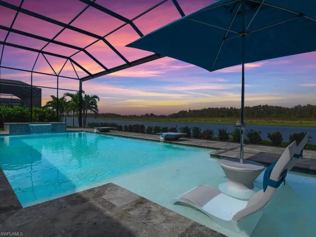Relax and enjoy this AMAZING outdoor living space. Custom pool, spa and sunshelf with a sprawling outdoor living area which is perfect for entertaining guests.