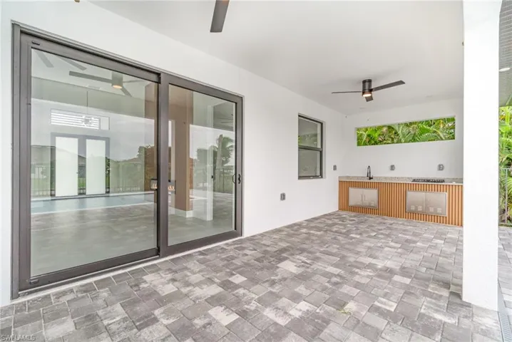 View of patio / terrace with ceiling fan
