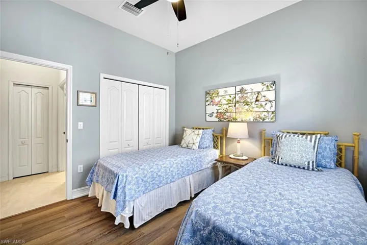 2nd guest bedroom with luxury vinyl  flooring & plantation shutters