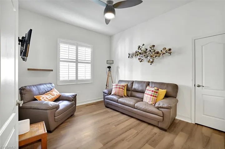 3rd guest bedroom or Den with luxury vinyl flooring
