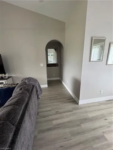 Vaulted ceiling with an arched entryway