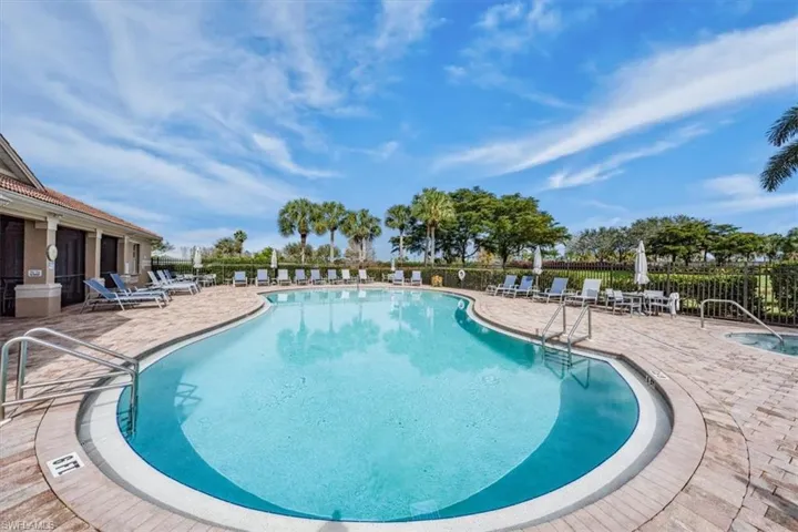 Pool and spa with an expansive deck area.