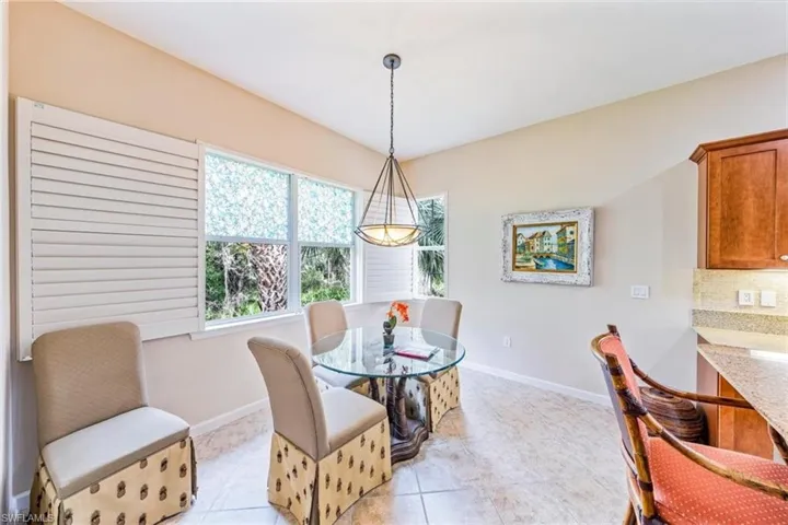 Breakfast area overlooking the rear yard and landscaped area with lots of wildlife and privacy.