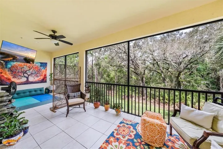 Sitting in this huge Lanai can feel like an atrium at times as you enjoy the preserve view.