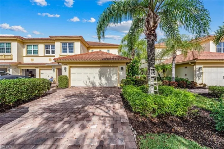 Two car garage w/wide driveway.