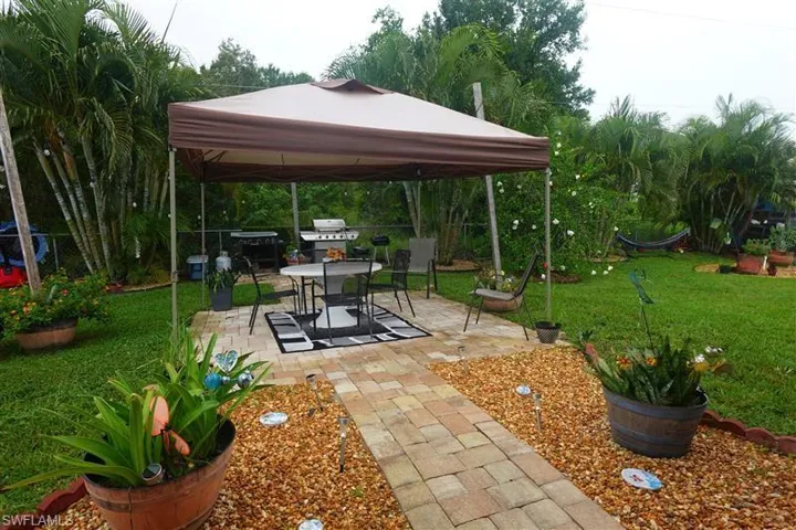 View of yard featuring a patio and a gazebo