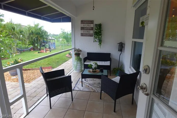 Balcony featuring outdoor lounge area and a patio area