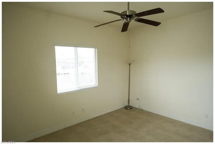 Unfurnished room with ceiling fan