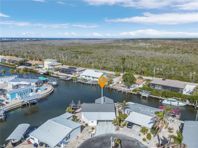 Home facing NW on intersecting canal