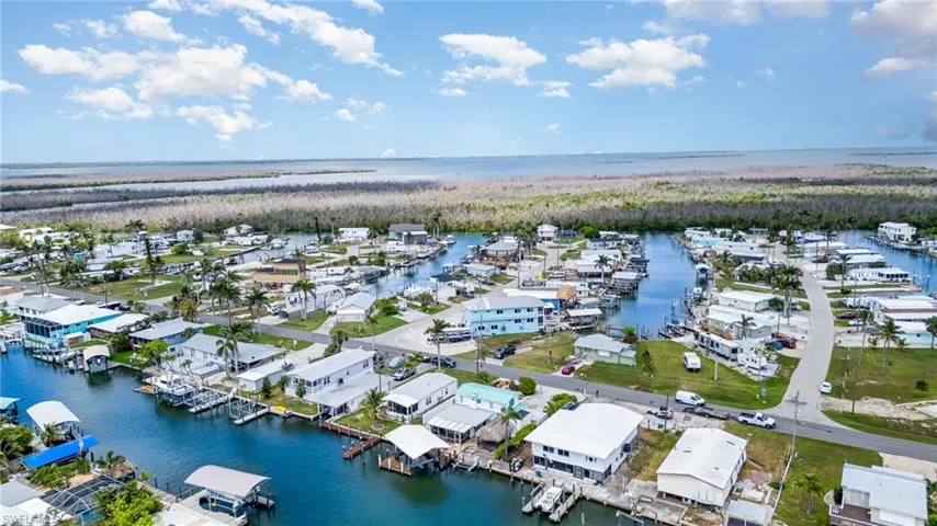 Aerial view of residential area with a large body of water