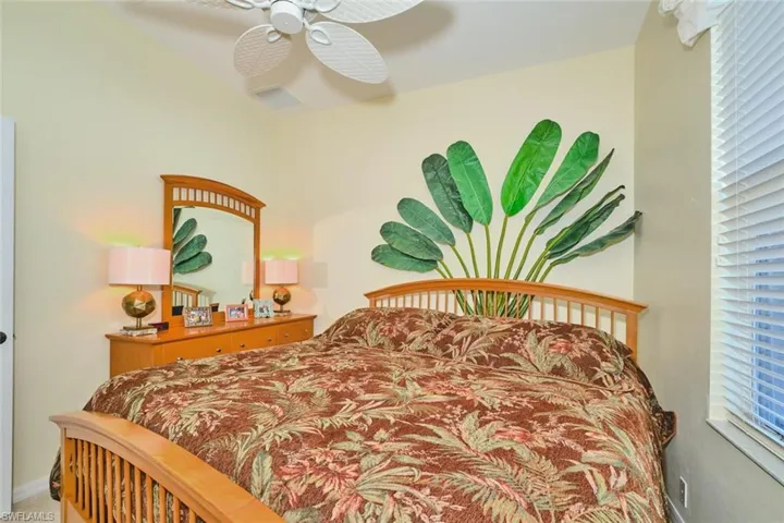 Bedroom featuring a ceiling fan