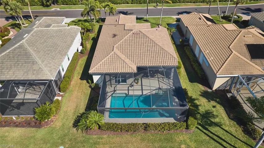 View from above of property featuring a pool