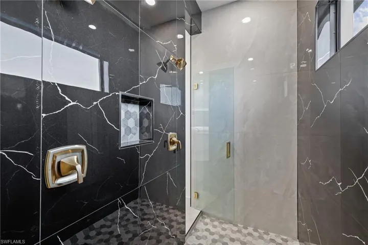 Bathroom with tiled shower