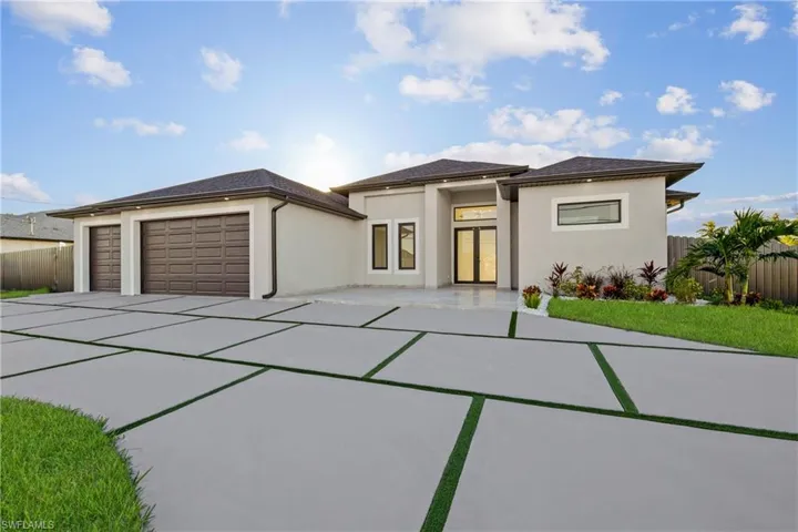 Prairie-style house with a garage