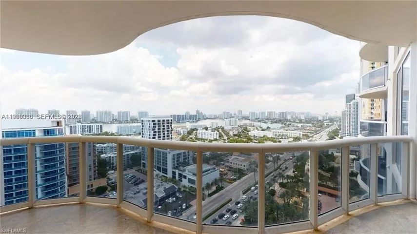 Balcony featuring a view of skyline