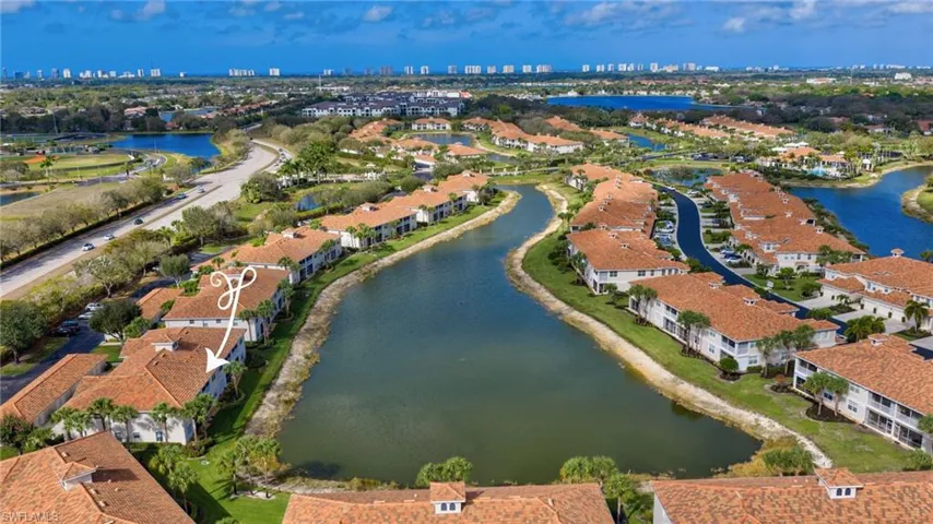 Aerial view of property's location featuring a nearby body of water