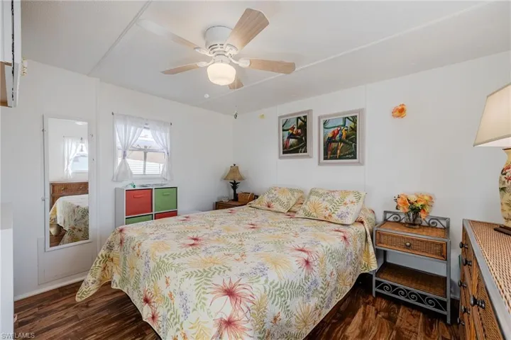 Bedroom featuring a ceiling fan and wood finished floors