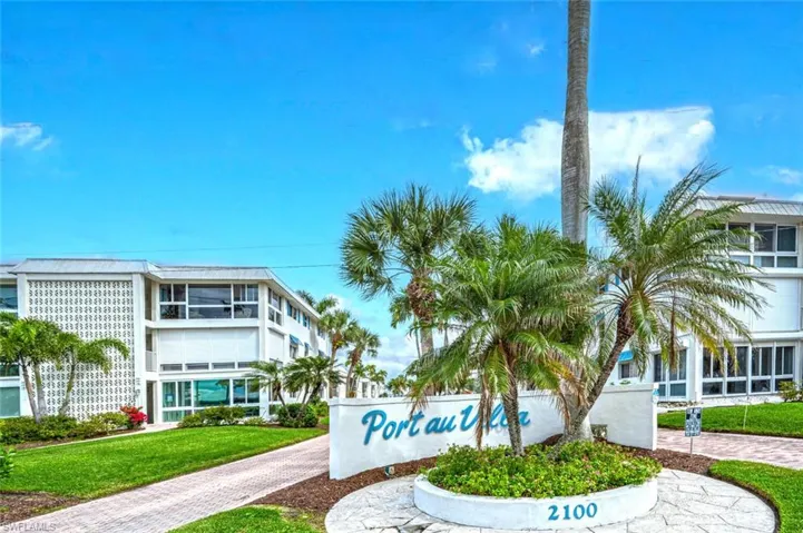 Enter paver driveway to Port au Villa.